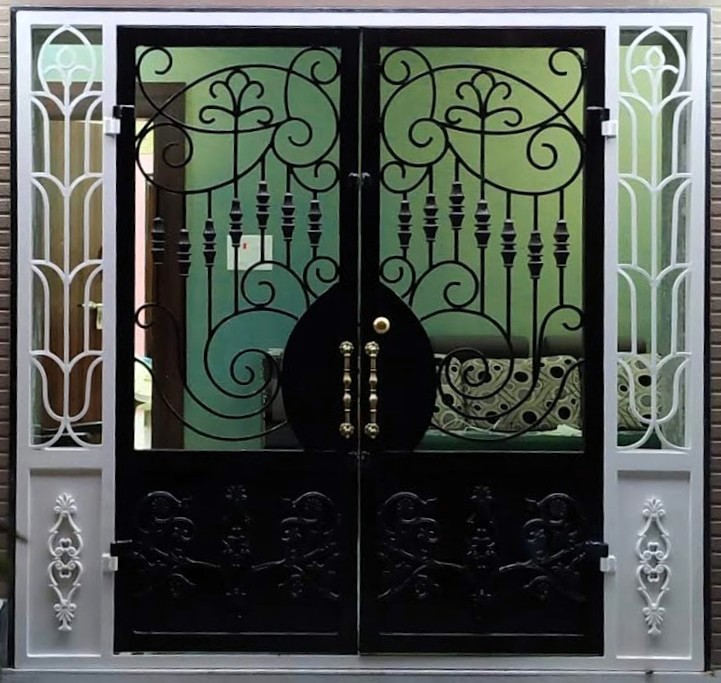 Large automated sliding entrance gate for a modern bungalow.